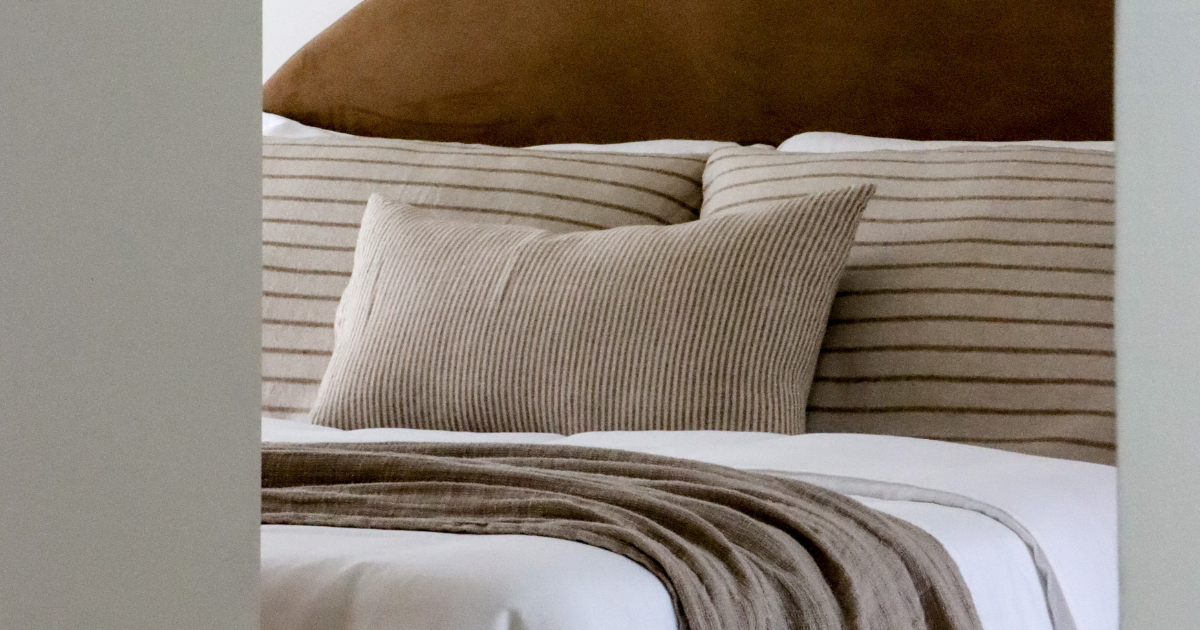 Layering different textures in property styling creates contrast, enhancing visibility in photos and making the space feel dimensional, rather than flat.